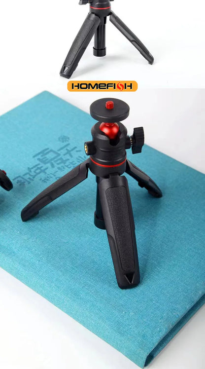 Portable extendable tripod for DSLR cameras, mobile phones, and desktops. Handle for live streaming.